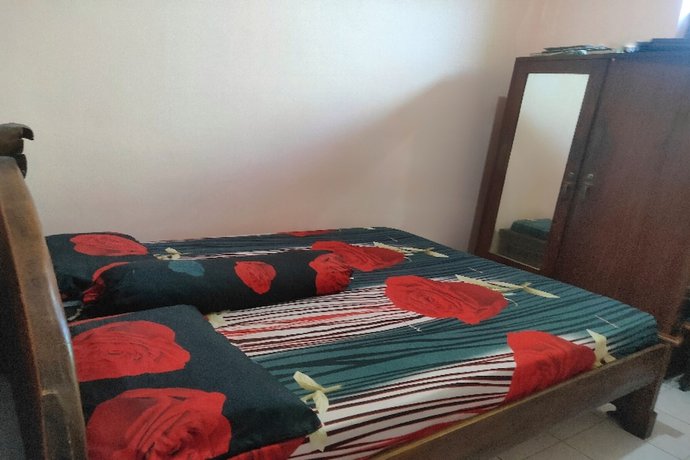 Imagen de la habitación del Hotel Oyo Homes 91098 Desa Wisata Tanjung Syariah. Foto 3