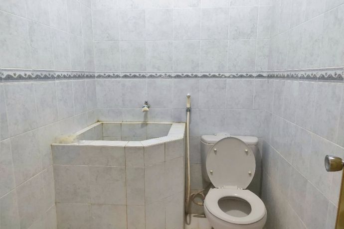 Imagen de la habitación del Hotel Oyo Homes 91098 Desa Wisata Tanjung Syariah. Foto 6