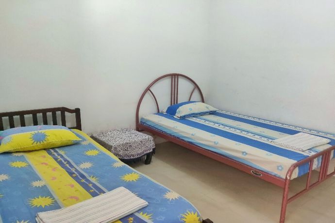 Imagen de la habitación del Hotel Oyo Homes 91098 Desa Wisata Tanjung Syariah. Foto 7