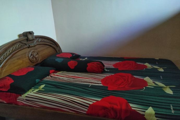 Imagen de la habitación del Hotel Oyo Homes 91098 Desa Wisata Tanjung Syariah. Foto 8