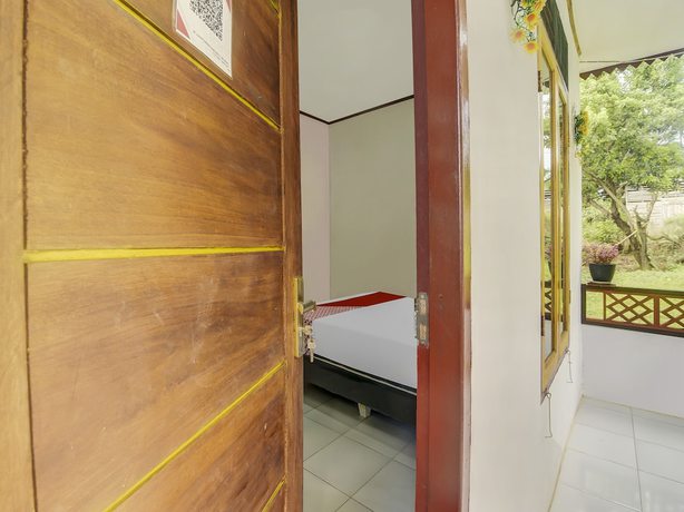 Imagen de la habitación del Hotel Oyo Homes 91101 Homesstay Desa Wisata Marinsow. Foto 2