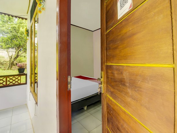 Imagen de la habitación del Hotel Oyo Homes 91101 Homesstay Desa Wisata Marinsow. Foto 6