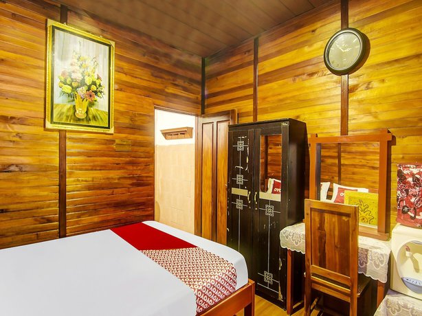 Imagen de la habitación del Hotel Oyo Homes 91101 Homesstay Desa Wisata Marinsow. Foto 7