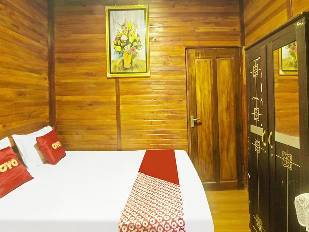 Imagen de la habitación del Hotel Oyo Homes 91101 Homesstay Desa Wisata Marinsow. Foto 11