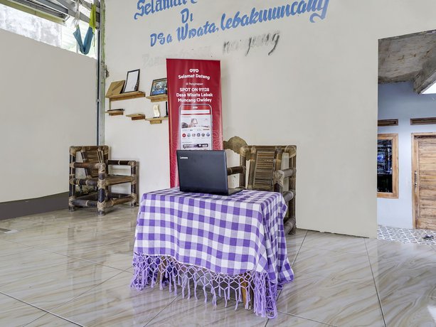 Imagen de los interiores del Hotel Oyo Homes 91128 Desa Wisata Lebakmuncang Ciwidey Syariah. Foto 16