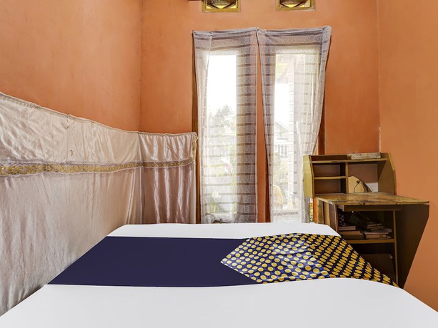 Imagen de la habitación del Hotel Oyo Homes 91128 Desa Wisata Lebakmuncang Ciwidey Syariah. Foto 5