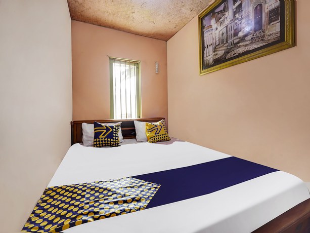 Imagen de la habitación del Hotel Oyo Homes 91128 Desa Wisata Lebakmuncang Ciwidey Syariah. Foto 8