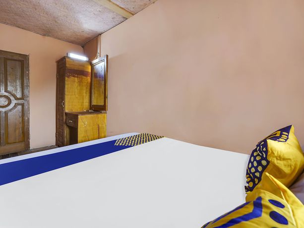 Imagen de la habitación del Hotel Oyo Homes 91128 Desa Wisata Lebakmuncang Ciwidey Syariah. Foto 9