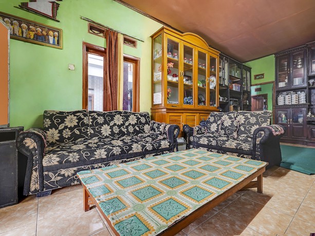 Imagen de los interiores del Hotel Oyo Homes 91128 Desa Wisata Lebakmuncang Ciwidey Syariah. Foto 19