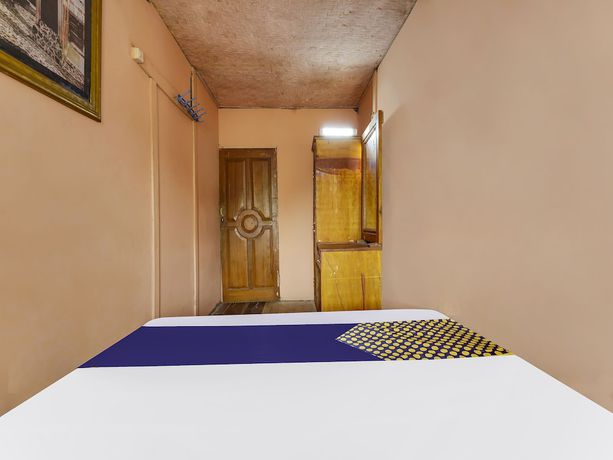 Imagen de la habitación del Hotel Oyo Homes 91128 Desa Wisata Lebakmuncang Ciwidey Syariah. Foto 11