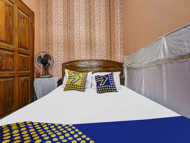 Imagen de la habitación del Hotel Oyo Homes 91128 Desa Wisata Lebakmuncang Ciwidey Syariah. Foto 13