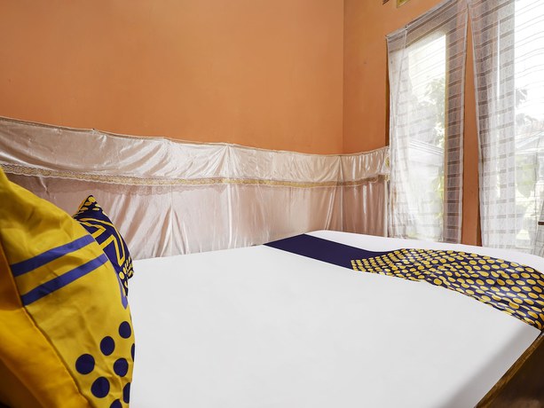 Imagen de la habitación del Hotel Oyo Homes 91128 Desa Wisata Lebakmuncang Ciwidey Syariah. Foto 14