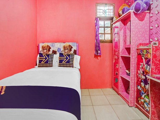 Imagen de la habitación del Hotel Oyo Homes 91133 Desa Wisata Sumber Agung Syariah. Foto 4