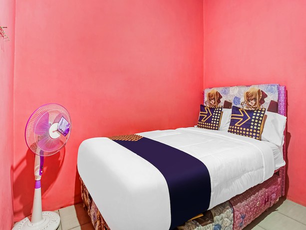 Imagen de la habitación del Hotel Oyo Homes 91133 Desa Wisata Sumber Agung Syariah. Foto 8