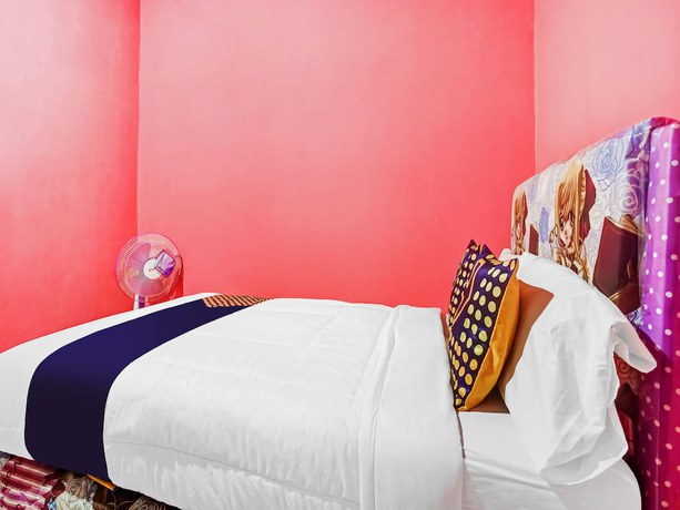 Imagen de la habitación del Hotel Oyo Homes 91133 Desa Wisata Sumber Agung Syariah. Foto 11