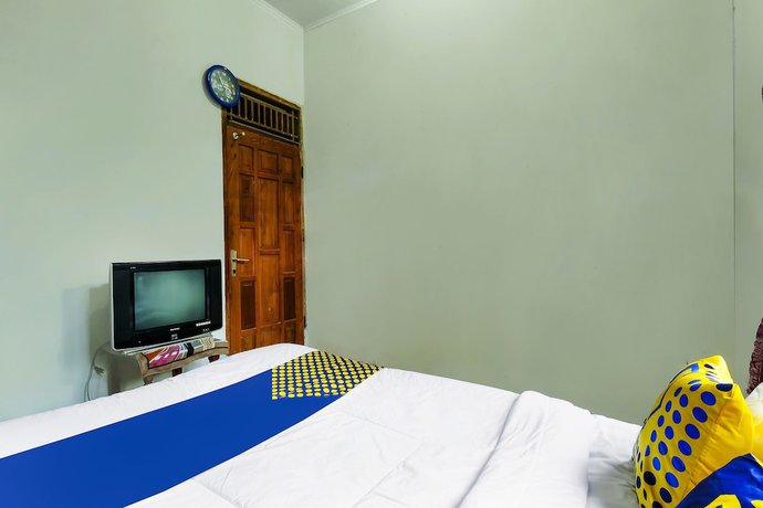 Imagen de la habitación del Hotel Oyo Homes 91154 Desa Wisata Wayang Manyaran Wonogiri. Foto 3