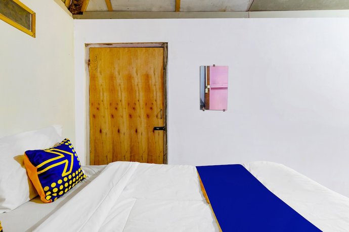 Imagen de la habitación del Hotel Oyo Homes 91154 Desa Wisata Wayang Manyaran Wonogiri. Foto 4