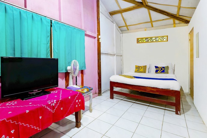 Imagen de la habitación del Hotel Oyo Homes 91154 Desa Wisata Wayang Manyaran Wonogiri. Foto 5