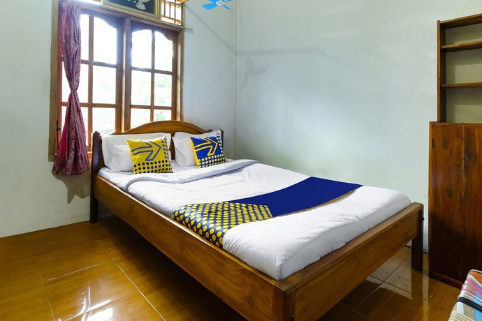 Imagen de la habitación del Hotel Oyo Homes 91154 Desa Wisata Wayang Manyaran Wonogiri. Foto 9