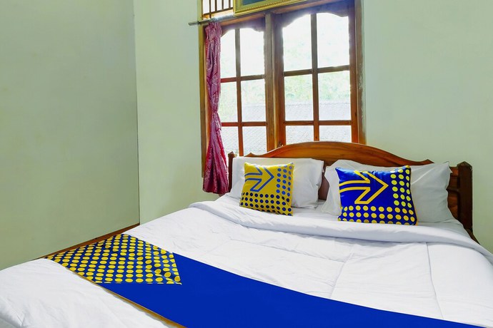 Imagen de la habitación del Hotel Oyo Homes 91154 Desa Wisata Wayang Manyaran Wonogiri. Foto 11