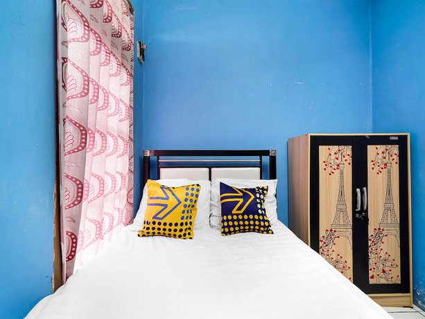 Imagen de la habitación del Hotel Oyo Homes 91156 Eco Tourism Big Farmer Desa Kertawangi Syariah. Foto 3