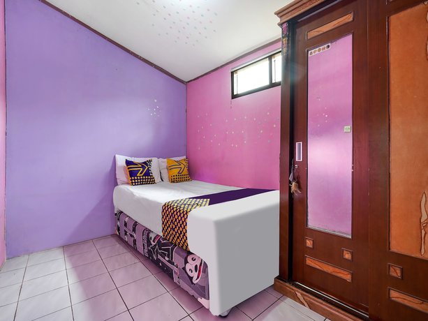 Imagen de la habitación del Hotel Oyo Homes 91156 Eco Tourism Big Farmer Desa Kertawangi Syariah. Foto 5