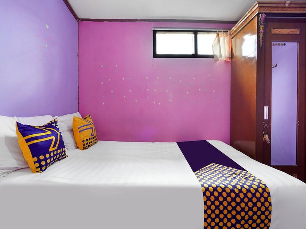 Imagen de la habitación del Hotel Oyo Homes 91156 Eco Tourism Big Farmer Desa Kertawangi Syariah. Foto 6