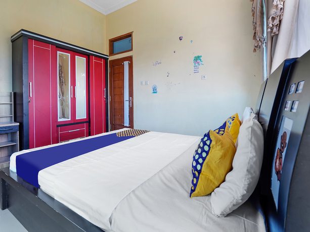 Imagen de la habitación del Hotel Oyo Homes 91156 Eco Tourism Big Farmer Desa Kertawangi Syariah. Foto 7