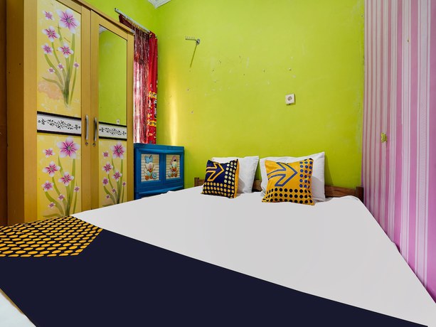 Imagen de la habitación del Hotel Oyo Homes 91156 Eco Tourism Big Farmer Desa Kertawangi Syariah. Foto 10