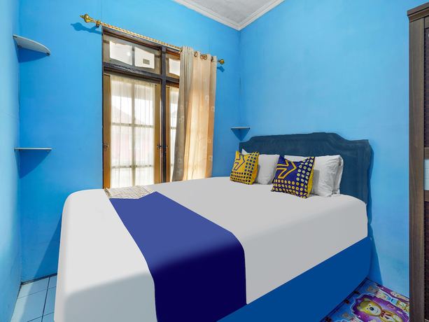 Imagen de la habitación del Hotel Oyo Homes 91156 Eco Tourism Big Farmer Desa Kertawangi Syariah. Foto 12