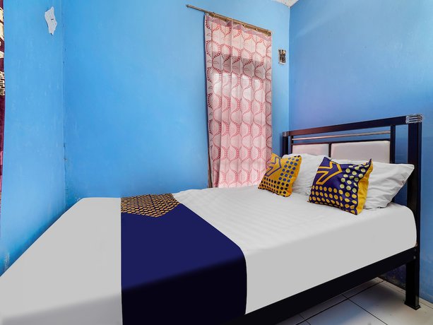 Imagen de la habitación del Hotel Oyo Homes 91156 Eco Tourism Big Farmer Desa Kertawangi Syariah. Foto 13