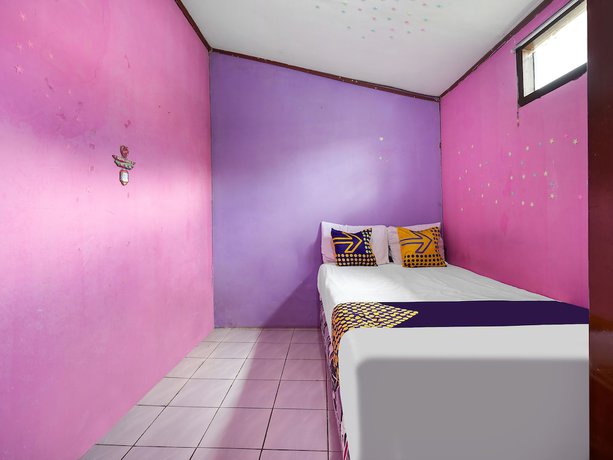 Imagen de la habitación del Hotel Oyo Homes 91156 Eco Tourism Big Farmer Desa Kertawangi Syariah. Foto 14