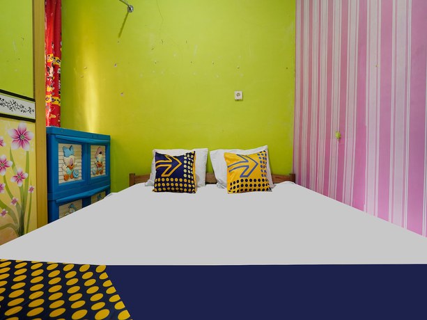 Imagen de la habitación del Hotel Oyo Homes 91156 Eco Tourism Big Farmer Desa Kertawangi Syariah. Foto 15