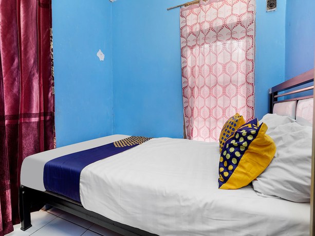 Imagen de la habitación del Hotel Oyo Homes 91156 Eco Tourism Big Farmer Desa Kertawangi Syariah. Foto 16