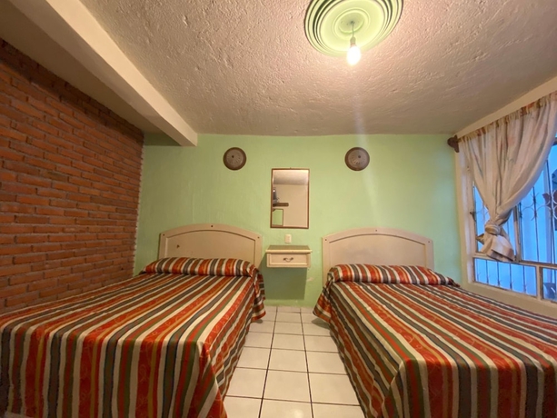 Imagen de la habitación del Hotel Oyo La Casita. Foto 4