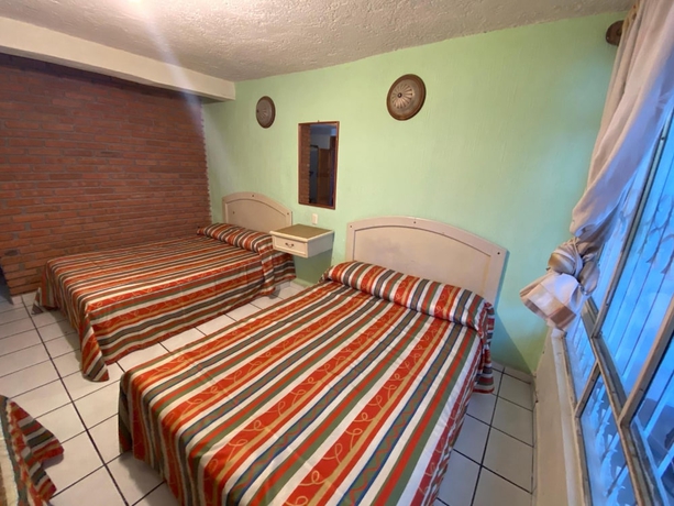 Imagen de la habitación del Hotel Oyo La Casita. Foto 5