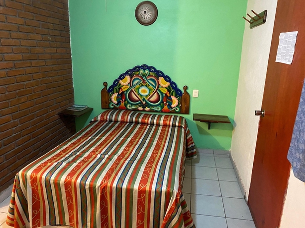 Imagen de la habitación del Hotel Oyo La Casita. Foto 6