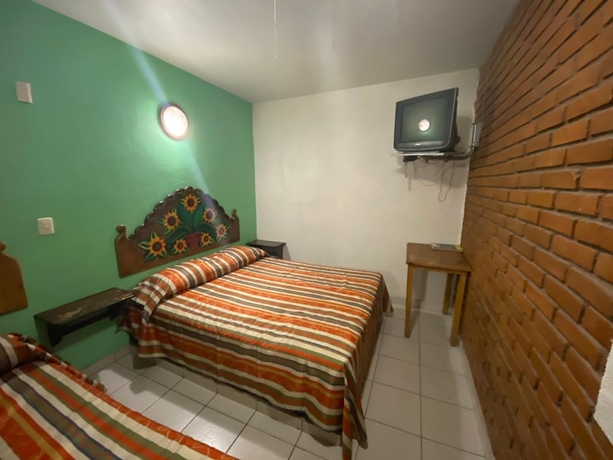 Imagen de la habitación del Hotel Oyo La Casita. Foto 8