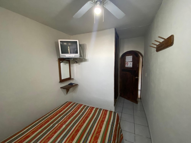 Imagen de la habitación del Hotel Oyo La Casita. Foto 9