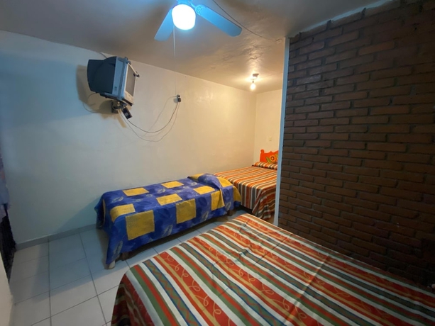 Imagen de la habitación del Hotel Oyo La Casita. Foto 11