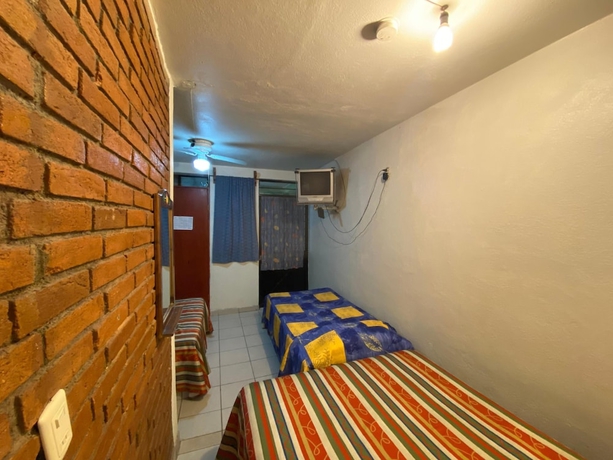 Imagen de la habitación del Hotel Oyo La Casita. Foto 12