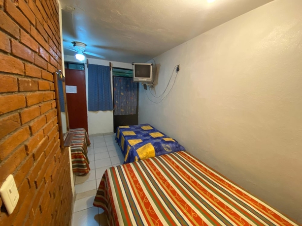 Imagen de la habitación del Hotel Oyo La Casita. Foto 13