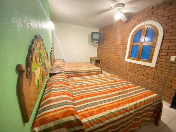 Imagen de la habitación del Hotel Oyo La Casita. Foto 17