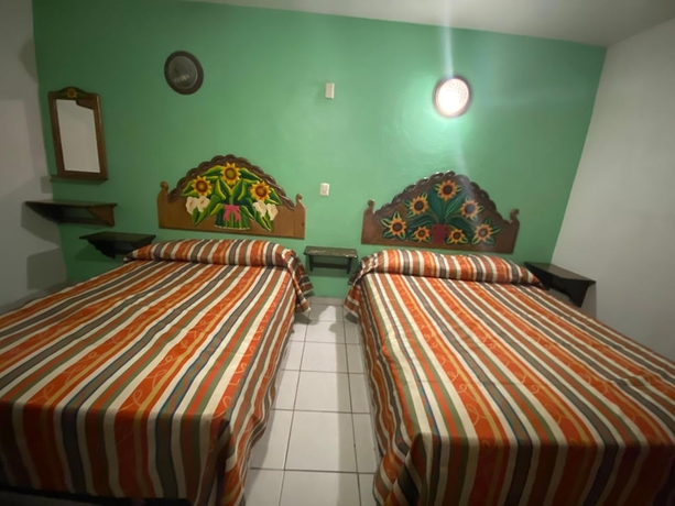 Imagen de la habitación del Hotel Oyo La Casita. Foto 18
