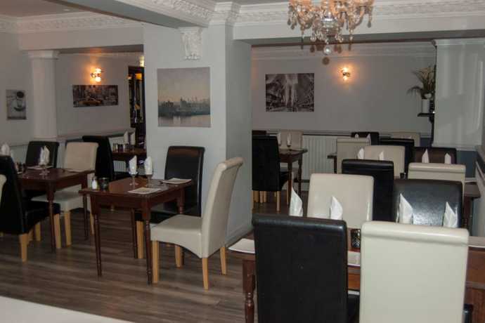 Imagen del bar/restaurante del Hotel Oyo La Spada Boutique. Foto 4