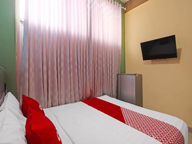 Imagen de la habitación del Hotel Oyo Life 91957 Roda Mas 2. Foto 15