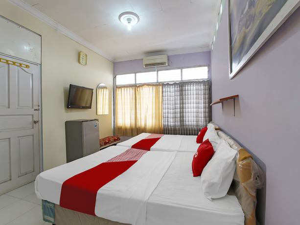 Imagen de la habitación del Hotel Oyo Life 91957 Roda Mas 2. Foto 17