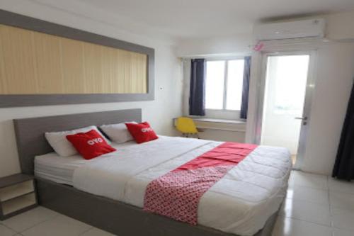 Imagen de la habitación del Hotel Oyo Life 92859 Biant House. Foto 18