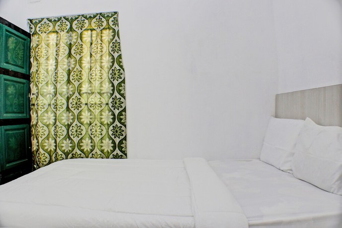 Imagen de la habitación del Hotel Oyo Life 93160 Kost Jenny Karawang. Foto 7