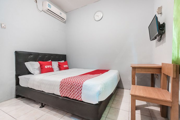 Imagen de la habitación del Hotel Oyo Living 1756 Amira Guest House. Foto 6